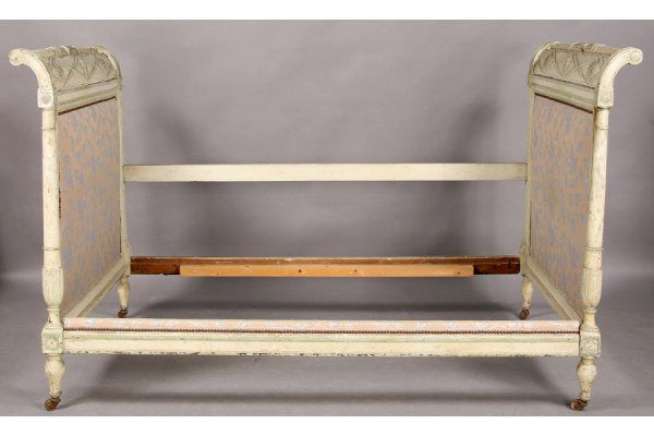 FRENCH DIRECTOIRE STYLE CARVED PAINTED DAYBED: A French Directoire style carved and painted daybed with high upholstered rolled ends circa 1920. Ht: 49.5" Width: 77" Depth: 50" ***PLEASE NOTE: All property shall be paid for by the purchaser within