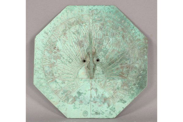 BRONZE SUNDIAL INCISED NUMBERING VERDIGRIS: A bronze sundial with incised numbering and decoration having a verdigris surface circa 1950. Width: 13.75" Depth: 13.75" ***PLEASE NOTE: All property shall be paid for by the purchaser within five (5