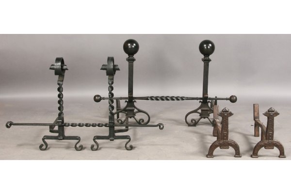 LOT 3 IRON PAIRS ANDIRONS FIREPLACE TOOLS: A lot of three iron pairs of andirons to include a cannonball pair, twisted pair, and an Arts and Crafts pair circa 1915. Largest: Ht: 27" Width: 12" Depth: 29" ***PLEASE NOTE: All property shall be p