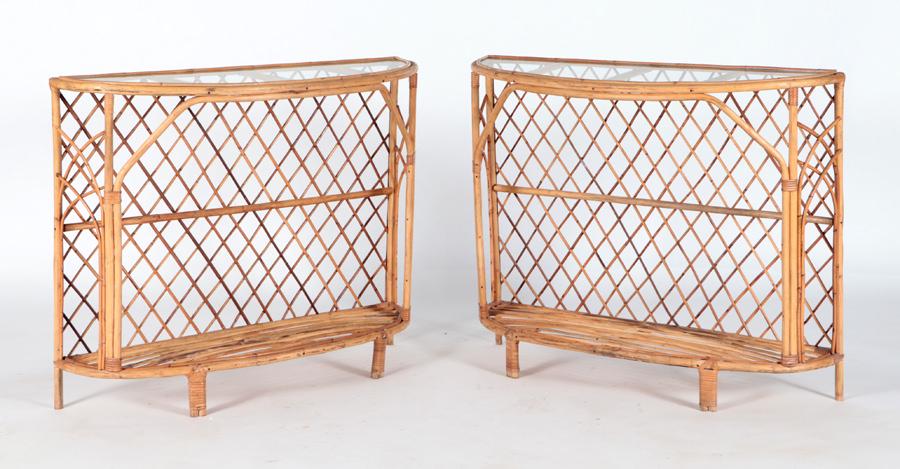 PAIR FRENCH RATTAN DEMILUNE CONSOLES MANNER ROYERE: A pair of French rattan demilune console tables in the manner of Royere. Having a woven design. Ht: 31.5" Wd: 40.5" Dpth: 13.5"