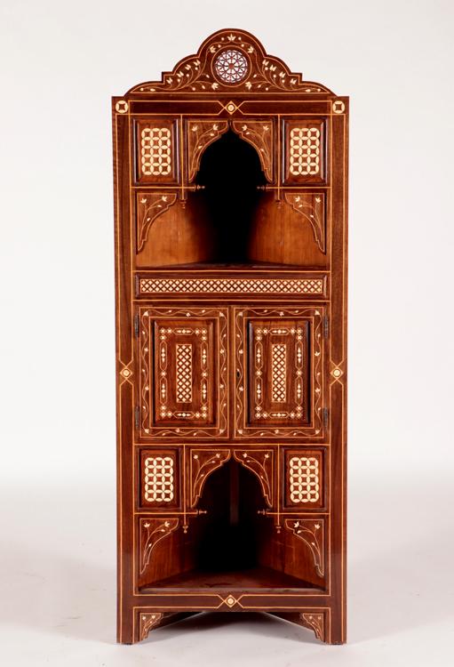 A SYRIAN STYLE INLAID CORNER CABINET: A Syrian style inlaid corner cabinet. Ht: 77.5" Wd: 29" Dpth: 17"