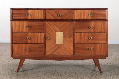 MID CENTURY MODERN 9-DRAWER PATCHWORK DRESSER: A mid century modern patchwork dresser having nine drawers and a single door. Ht: 37" Wd: 55" Dpth: 18.5"