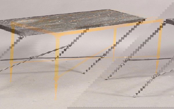 FRENCH BRONZE COFFEE TABLE INSET MARBLE TOP: A French bronze coffee table with inset marble top supported on reeded columns with x-form stretcher circa 1940. Ht: 16" Width: 40" Depth: 18"