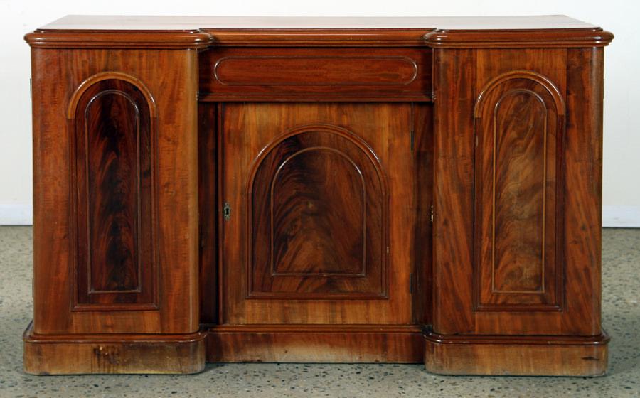 19TH CENTURY CONTINENTAL 3-DOOR CABINET: A nineteenth century Continental three door cabinet with arched panels. Perfect as a bathroom sink cabinet. No key for side doors, just center. Ht: 35.75" Wd: 60" Dpth: 21.5"