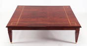 AN OVERSIZED INLAID MAHOGANY COFFEE TABLE