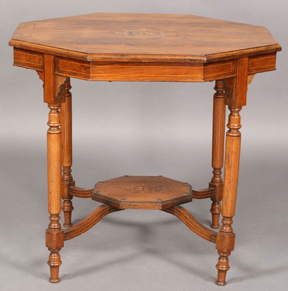 ANTIQUE ENGLISH EDWARDIAN INLAID OCTAGONAL TABLE: English Edwardian octagonal table with inlaid top, lower shelf and turned legs circa 1890. Ht: 27" Width: 30" Depth: 30" Terms & Conditions: PLEASE NOTE: All property shall be paid for by the purchase