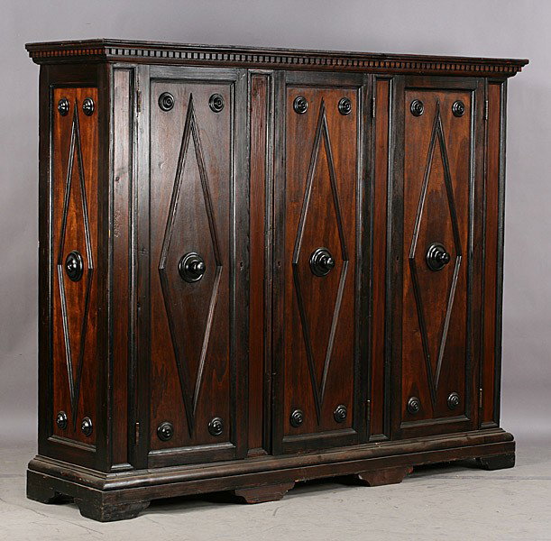 NORTHERN ITALIAN ANTIQUE PINE LIBRARY CABINET: Northern Italian pine library cabinet circa 1910. Ht: 69" Width: 84" Depth: 22" Terms & Conditions: PLEASE NOTE: All property shall be paid for by the purchaser within five (5) business days of the sa
