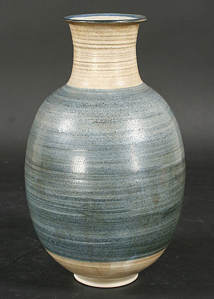 GERRY WILLIAM STUDIO POTTERY STONEWARE VASE: Gerry Williams (American, b. 1926). A blue and beige studio pottery stoneware vase. Ht: 11.5"