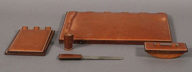 SET LEATHER DESK ACCESSORIES LABELED MATTALDI: Set of modern leather desk accessories labeled Mattaldi comprising a portfolio, blotter, notepad, ink blotter, letter opener and nib holder. All having whipped stitched edging. Ht: 14" Width: 19.5"