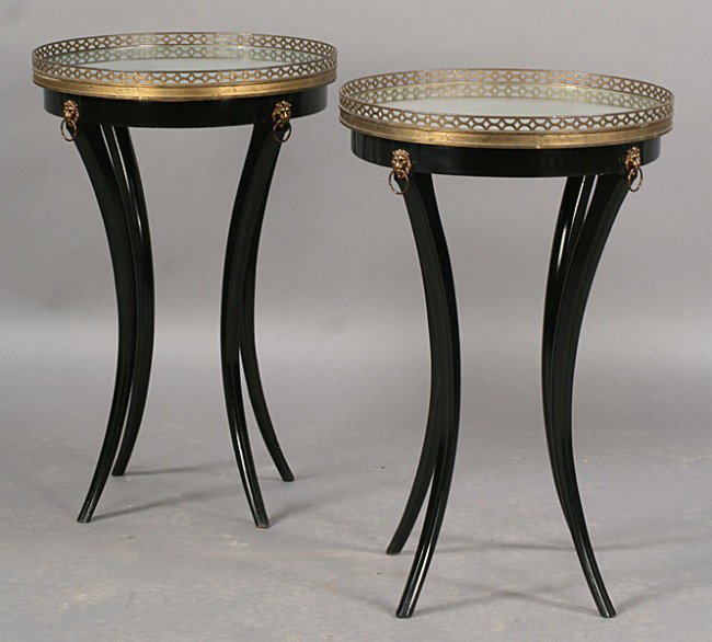 PR DIRECTOIRE STYLE GUERIDONS TABLES BRONZE LIONS: Pair of Directoire style gueridons tables having distressed mirror tops with bronze galleries over bronze lion mounted aprons circa 1940. With downswept legs. Ht: 27.5" Width: 18"