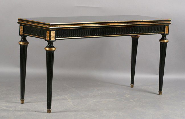 VINTAGE DIRECTOIRE STYLE JANSEN FLIP TOP TABLE: Ebonized Directoire style flip top dining table attributed to Jansen with gilt trim and fluted and tapered legs circa 1940. Ht: 31" Width: 59" Depth: 20"