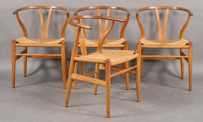 SET 4 CARL HANSEN HANS WEGNER Y-CHAIRS SIGNED: Set of Four Hans Wegner Y-chairs signed Carl Hansen having rush seats. Ht: 28.5" Width: 21" Depth: 20"