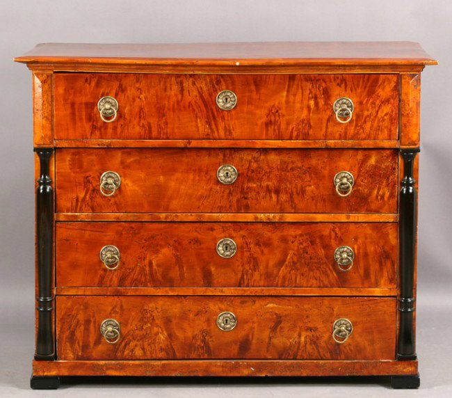 ANTIQUE BIEDERMEIER BURLED COMMODE 4 DRAWERS: Antique Biedermeier burled commode having four drawers flanked by ebonized and turned half round columns circa 1840. Ht: 41" Width: 51" Depth: 24"