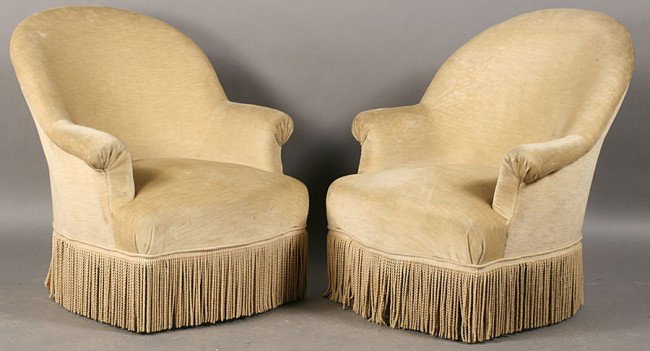 PAIR NAPOLEON III SLIPPER CHAIRS MOHAIR UPHOLSTER: Pair Napoleon III slipper chairs having mohair upholstery and fringe circa 1900. Ht: 33" Width: 25" Depth: 25"