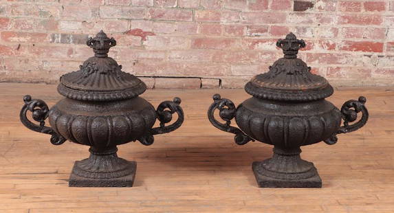 PAIR OF FRENCH GARDEN URNS WITH COVERS 19TH C.: A pair of French nineteenth century cast iron garden urns with removable winter covers. Ht: 24" Wd: 24" Dpth: 15.5"