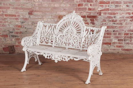 CAST IRON GARDEN BENCH WITH ARCHED DESIGN: A cast iron garden bench with arched design. Ht: 37.75" Wd: 47.75" Dpth: 28.25" Seat: 14.75"