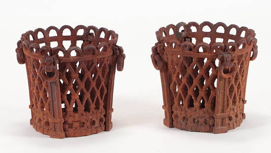 PAIR REGENCY STYLE CAST IRON PLANTERS: A pair of regency style cast iron garden planters. Ht: 13.5" Wd: 14.25"