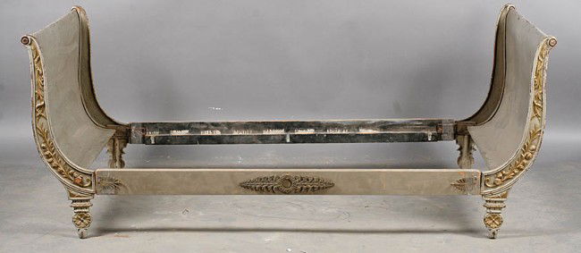 ANTIQUE CAST IRON DAYBED FRENCH WOOD SIDE RAILS: A French antique cast iron daybed in the classical Empire taste having high shaped sides with relief decoration and wood side rails circa 1880. Ht: 33" Depth: 41"