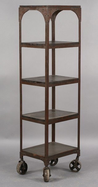 INDUSTRIAL METAL ETEGERE 5 WOOD SHELVES CASTERS: Industrial metal etegere with five wood shelves all raised on casters. Ht: 63" Width: 18" Depth: 14"