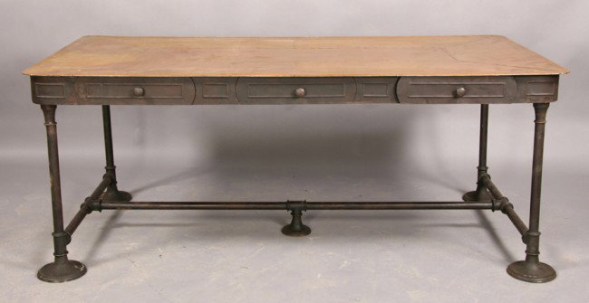 INDUSTRIAL PARTNERS DESK COPPER TOP 3 DRAWERS: Interesting industrial partners desk with copper top over three drawers on each side supported on round legs with cross stretchers and flare feet. Ht: 29.5" Width: 84" Depth: 38.5"