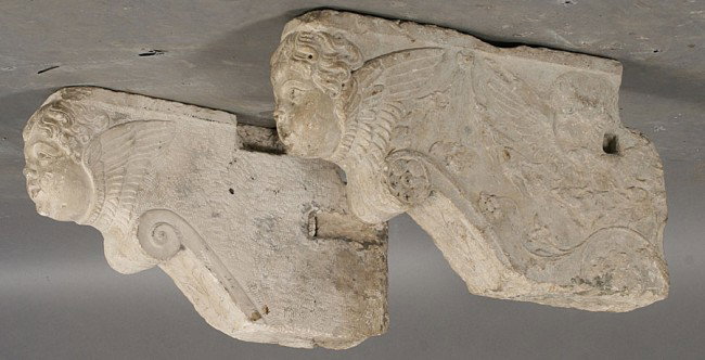 17TH CENT CARVED MARBLE CORBELS RENAISSANCE TASTE: An exceptional pair of seventeenth century Continental carved marble corbels in the Renaissance taste with putti face and wings. Ht: 10.5" Width: 3.5" Depth: 19"