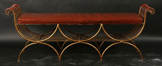 ITALIAN GILT IRON WINDOW BENCH LOOSE CUSHION: Italian gilt iron window bench with loose cushion and strap work seat circa 1950. Ht: 23" Width: 65" Depth: 18"