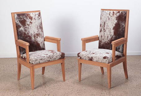 PAIR FRENCH CERUSED OAK ARMCHAIRS BY JALLOT C.1940: A pair of French cerused oak arm chairs covered in animal hide by Maurice Jallot C 1940. Ht: 43.5" Wd: 24.5" Dpth: 25" Seat: 20"