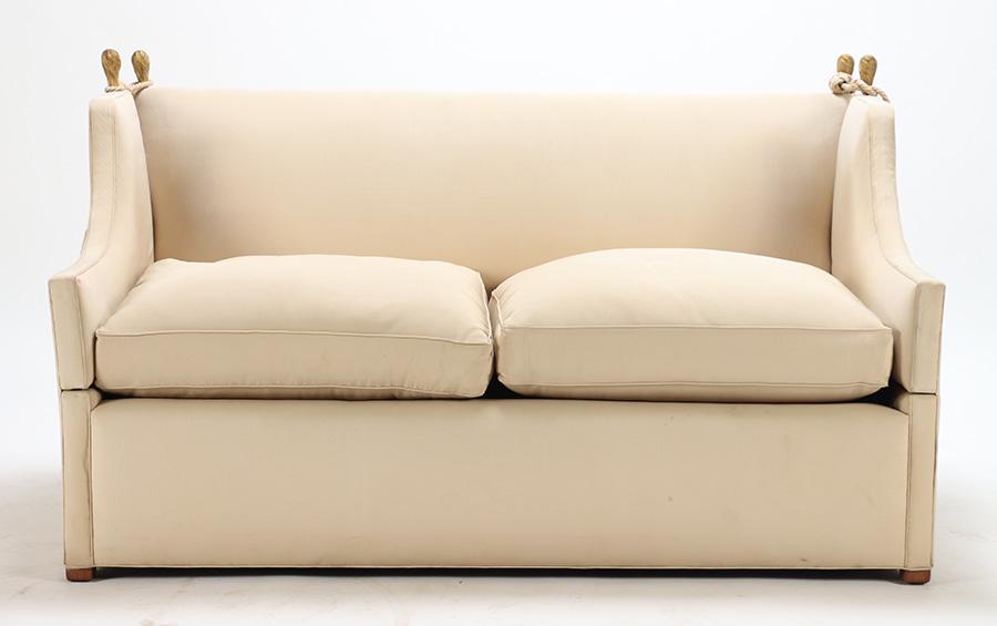AN UPHOLSTERED "KNOLL" STYLE SOFA HAVING BRONZE (1 of 9)