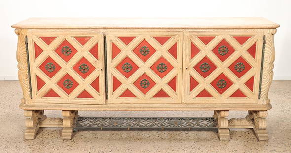 CERUSED OAK SIDEBOARD JEAN-CHARLES MOREUX C.1940: A cerused oak sideboard attributed to Jean-Charles Moreux C 1940. The case having inset leather panels with bronze mounts and a painted iron stretcher. Ht: 43" Wd: 94.25" Dpth: 19.5"