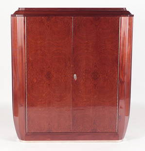 FRENCH AMBOYNA AND MAHOGANY CABINET MONTAGNAC 1930: French amboyna and mahogany cabinet by Pierre-Paul Montagnac C 1930. The interior made from exceptional mahogany and the case resting on a nickeled base. French polished. Ht: 63.75" Wd: 59" Dpth: 13.5