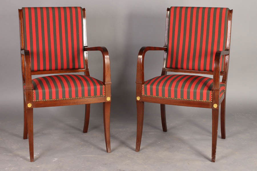 PAIR EMPIRE STYLE ARMCHAIRS UPHOLSTERED: A pair of empire style armchairs attributed to De Coene Freres having upholstered back and seat and bronze rondel decoration circa 1940. Ht: 37" Width: 21.75" Depth: 21"