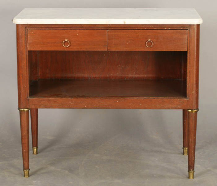 FRENCH LOUIS XVI MARBLE TOP SIDE CABINET: A Jansen French Louis XVI style marble top side cabinet having two drawers over an open shelf and bronze mounted tapered legs circa 1950. Ht: 24.5" Width: 28" Depth: 14"