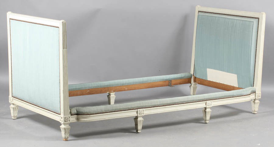 JANSEN DIRECTOIRE STYLE CARVED DAYBED C.1940: A good Jansen Directoire style daybed having two carved and upholstered ends with one straight and one shaped rail circa 1940. Ht: 36" Width: 78.5" Depth: 37"