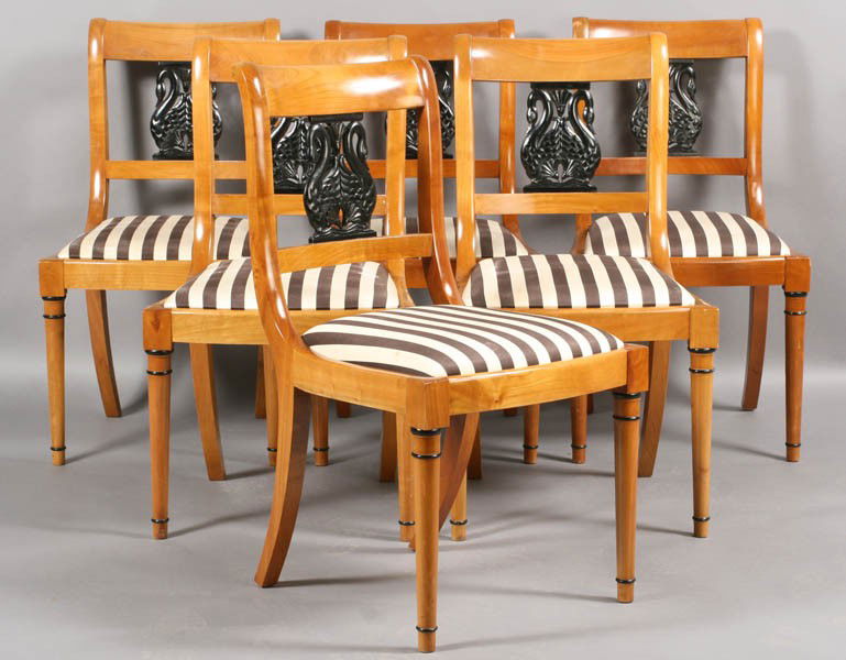 SET 6 BEIDERMEIER STYLE DINING CHAIRS: Set of six Biedermeier style dining chairs having ebonized swan carved back splats over slip seats and turned legs. Ht: 34" Width: 17" Depth: 16"
