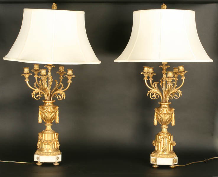 PAIR 5 ARM DOMED BRONZE URN LAMPS C.1920: A pair of five arm dore bronze urn form lamps with foliate garlands and icanthus leaf decoration circa 1920. Ht: 35" Width: 11" Depth: 6"