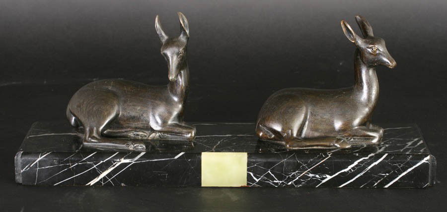 PR ART DECO METAL DOES MARBLE PLINTH C.1925: A pair of Art Deco metal does on a marble and alabaster plinth circa 1925. Ht: 6" Width: 15" Depth: 4"