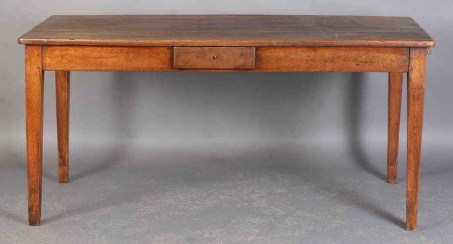 19TH CENT FRENCH WORK TABLE SMALL DRAWER: Nineteenth century French work table with small drawer, and one end slide supported on tapered legs circa 1840. Ht: 30" Width: 63" Depth: 29.5"