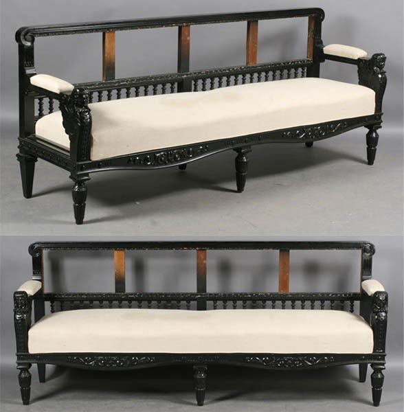 PAIR ANTIQUE AESTHETIC SETTEES UPHOLSTERED: A pair of ebonized Victorian aesthetic movement settees having a tailored back with spindles over upholstered seat and open arms circa 1870. Supported on carved and turned legs. Ht: 36.5" Width: 86.5"