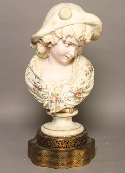 PARIAN BUST YOUNG GIRL HAND PAINTED: A parian bust of young girl with applied floral hand painted embellishment to her shawl circa 1900. Ht: 19" Width: 9" Depth: 9"