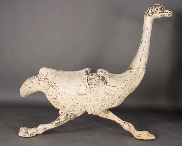 FIBERGLASS OSTRICH CAROUSEL FIGURE: A fiberglass ostrich carousel figure with remnants of old paint surface. Ht: 55" Width: 12" Depth: 60"