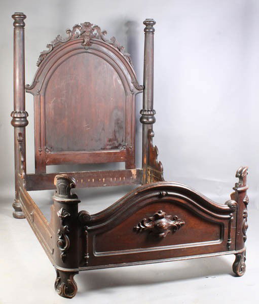 ANTIQUE VICTORIAN ROSEWOOD 4 PC BEDROOM SET: American Victorian rosewood four piece bedroom set including two marble top chests, a single end table, an arched mirror and impressive bed. Lot includes an arched mirror. Circa 1880. Bed dimensions: