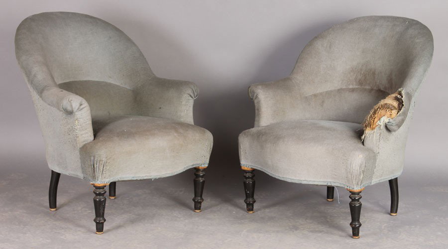 PR ANTIQUE FRENCH ARCHED BACK SLIPPER CHAIRS: Pair of antique French upholstered slipper chairs having arched backs, rolled arms and ebonized turned legs circa 1890. Ht: 34" Width: 24" Depth: 24"
