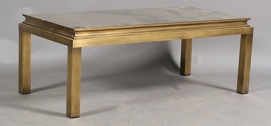 FRENCH MODERN BRONZE COFFEE TABLE SMOKED MIRROR: A French mid century modern bronze coffee table having a smoked mirrored top over a bronze base with Parson's type legs circa 1970. Ht: 14.5" Width: 38" Depth: 19"