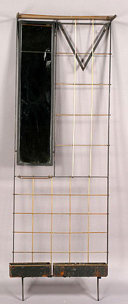 MID CENT MODERN WALL MOUNTED BRASS IRON HALL RACK: Mid century modern wall mounted wrought iron and brass hall rack having a group of hooks, a mirror and a drip pan for umbrellas circa 1950. Ht: 70" Width: 24" Depth: 4.5"