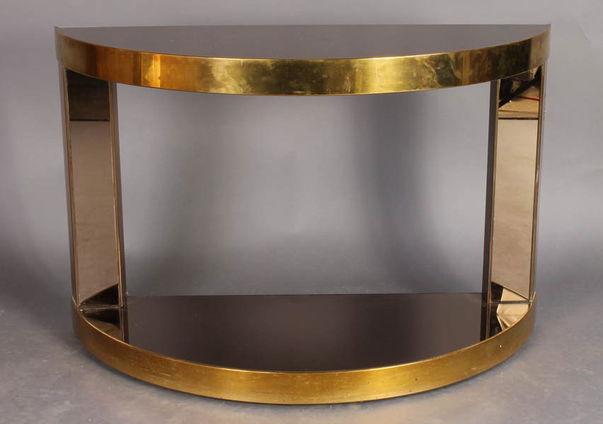 MIRRORED DEMILUNE CONSOLE TABLE C.1970: Mid century modern brass and copper colored mirrored demilune console circa 1970. Ht: 28.5" Width: 43" Depth: 17"