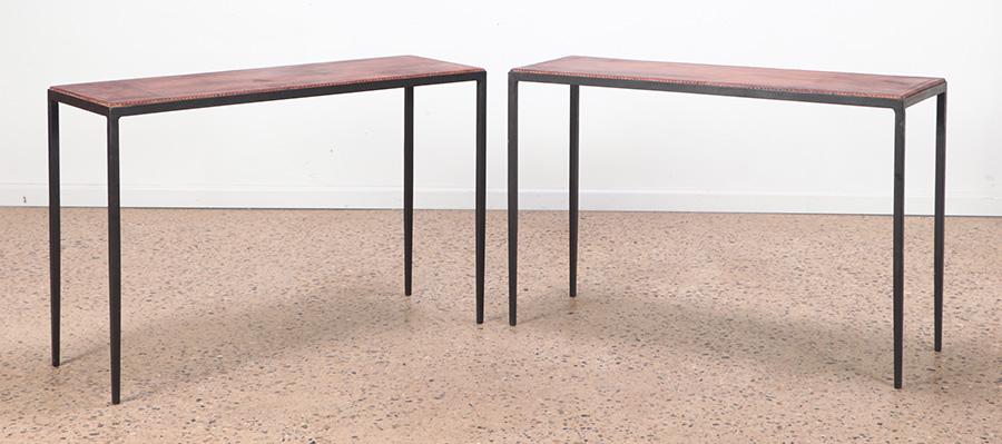 PAIR CONSOLE TABLES MANNER FRANK: A pair of iron and leather console tables in the manner of Jean-Michel Frank. Ht: 29" Wd: 43" Dpth: 15"