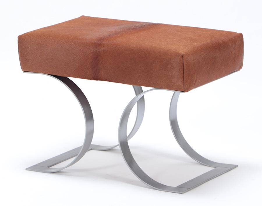 IRON BENCH IN THE MANNER OF KARL SPRINGER WITH COW: Iron bench in the manner of Karl Springer with cow hide upholstery. Ht: 18" Wd: 24" Dpth: 16"