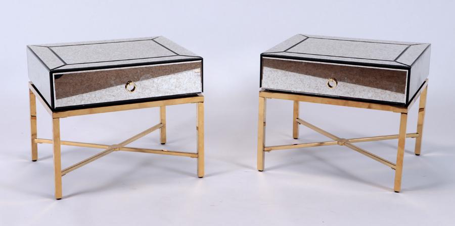 A pair of mirrored and brass end tables with a single drawer in the manner of Serge Roche. Ht:: A pair of mirrored and brass end tables with a single drawer in the manner of Serge Roche. Ht: 20.75" Wd: 24" Dpth: 20.25"