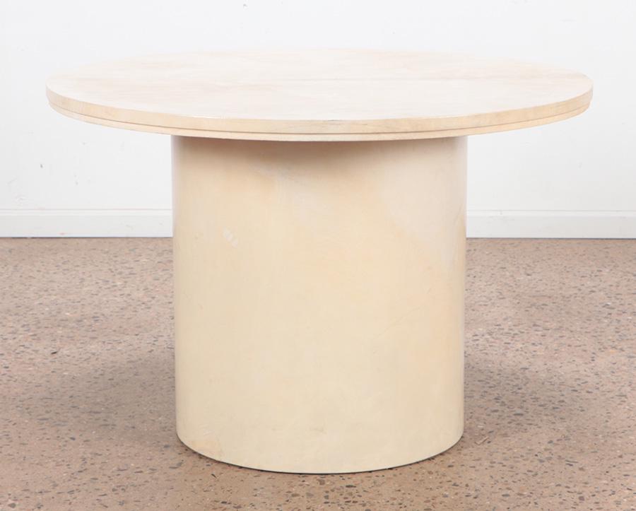 A round parchment covered center table C 1960 in the manner of Samuel Marx. Ht: 29.5" Dia: 43.5": A round parchment covered center table C 1960 in the manner of Samuel Marx. Ht: 29.5" Dia: 43.5"