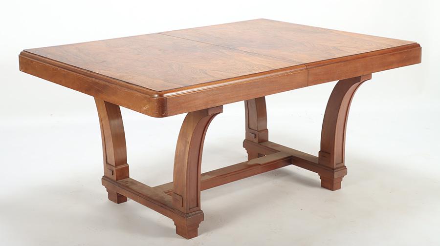An Art Deco rosewood dining table having highly figured top resting on flared legs circa 1930. Ht: (1 of 5)